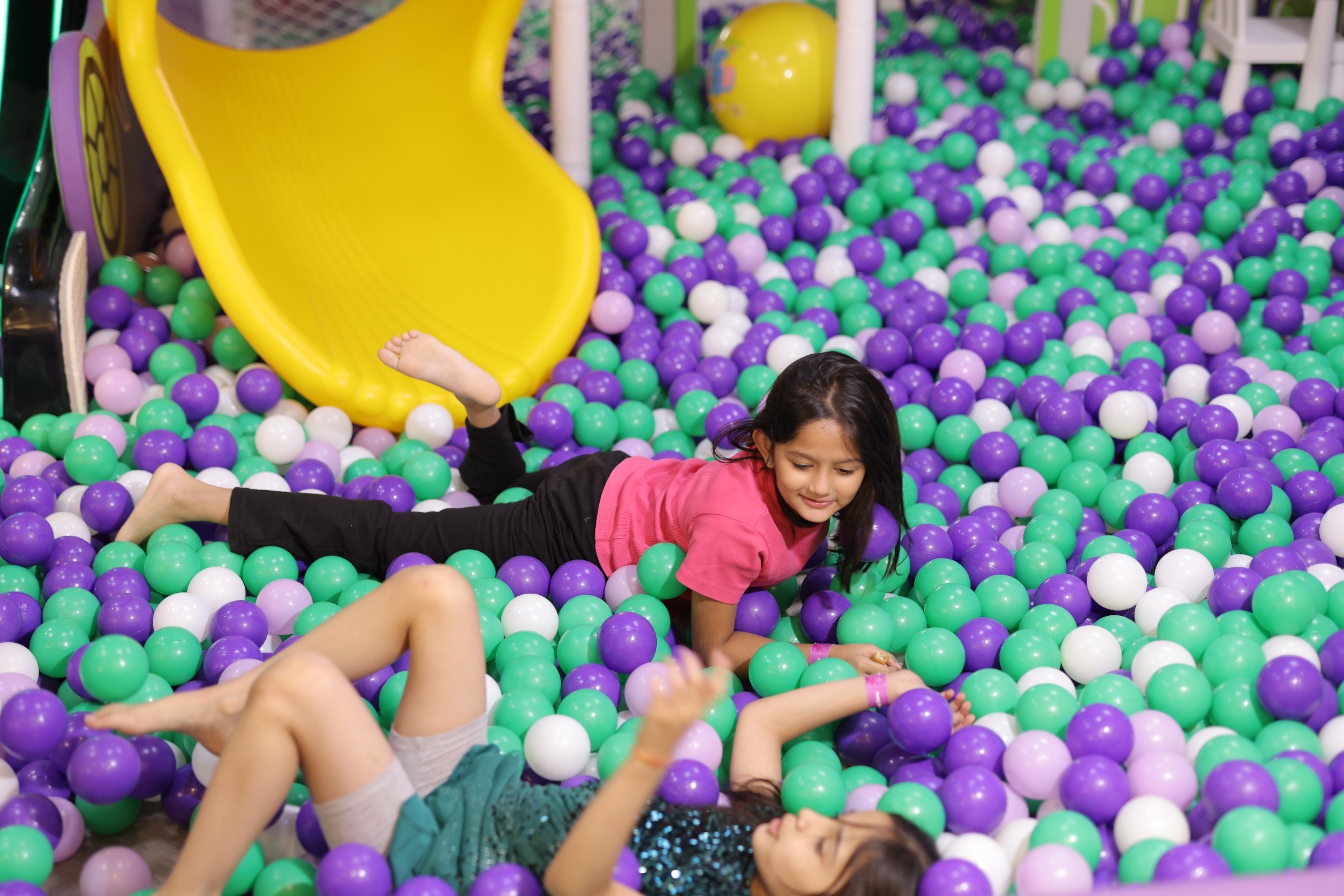 kids playing in ball pit at rumble zone in the vensej mall gurgaon a kids friendly mall in gurgaon